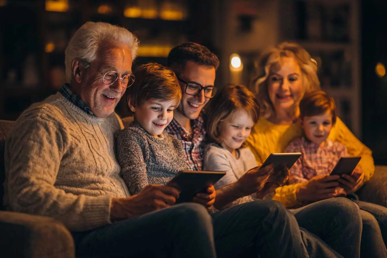 Happy family watching IPTV service together on multiple devices